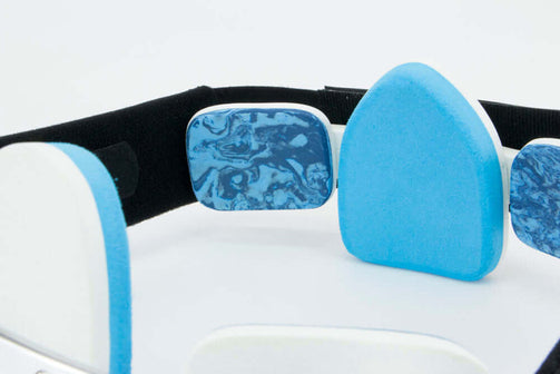 Pectus brace male with white panels and blue foam. Inner close up