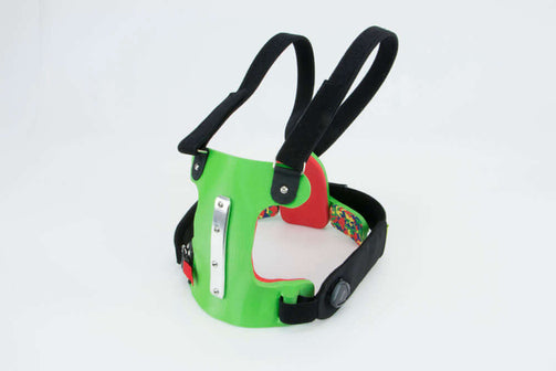 Pectus brace female with green panels and red foam. Overview picture